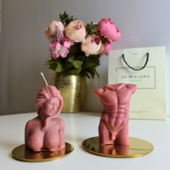 Набор темно-розовых двух ароматических свечей бюст мужчины и женщины